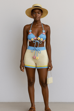 Knitted suit with strapless top and high waist shorts, ideal for summer fashion in vibrant blue and yellow colors.