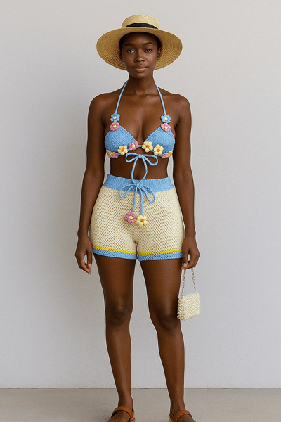 Knitted suit with strapless top and high waist shorts, ideal for summer fashion in vibrant blue and yellow colors.
